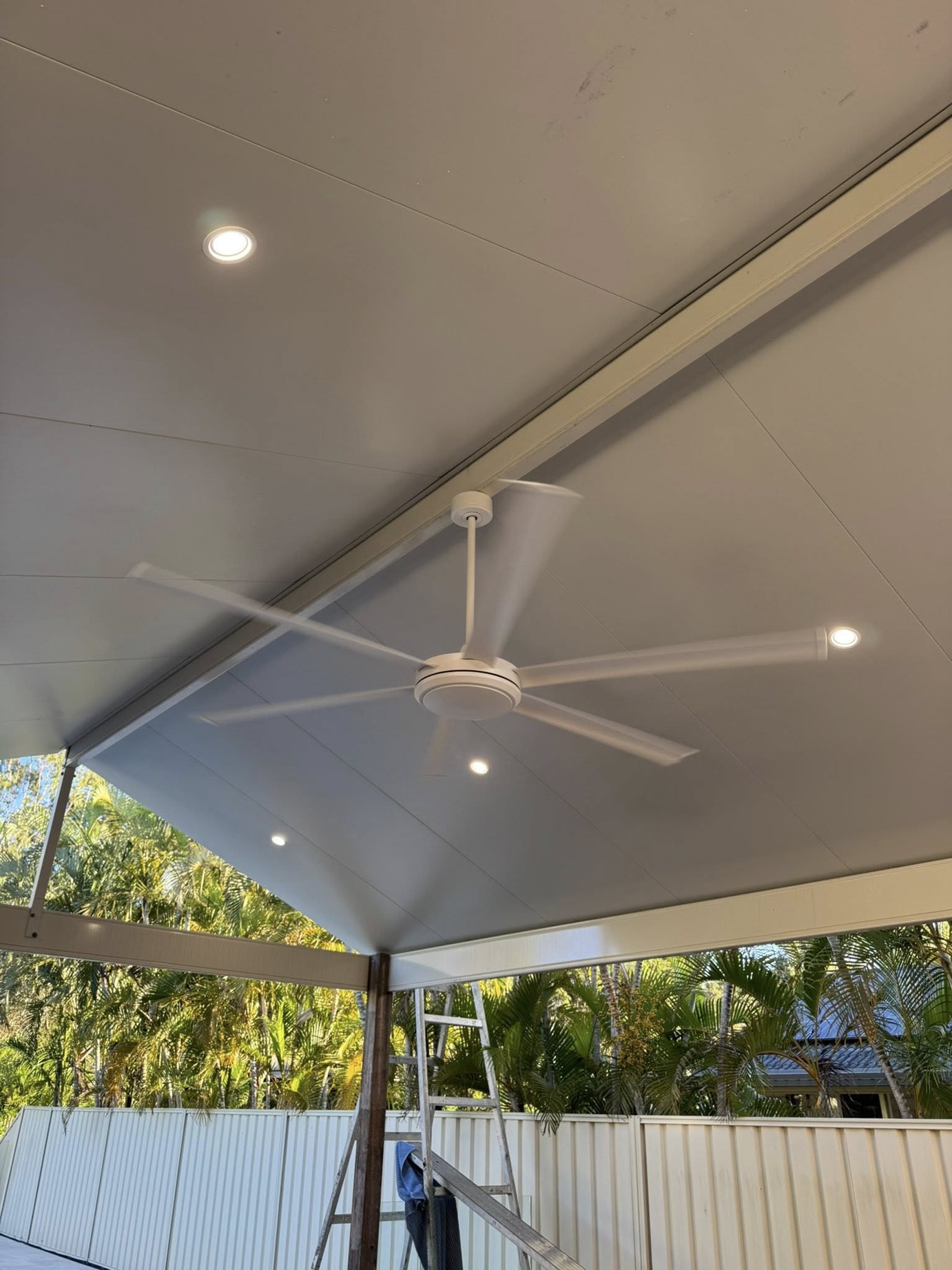 Outdoor ceiling fan and LED downlight installation under patio - Fully Spark'd Electrical Logan