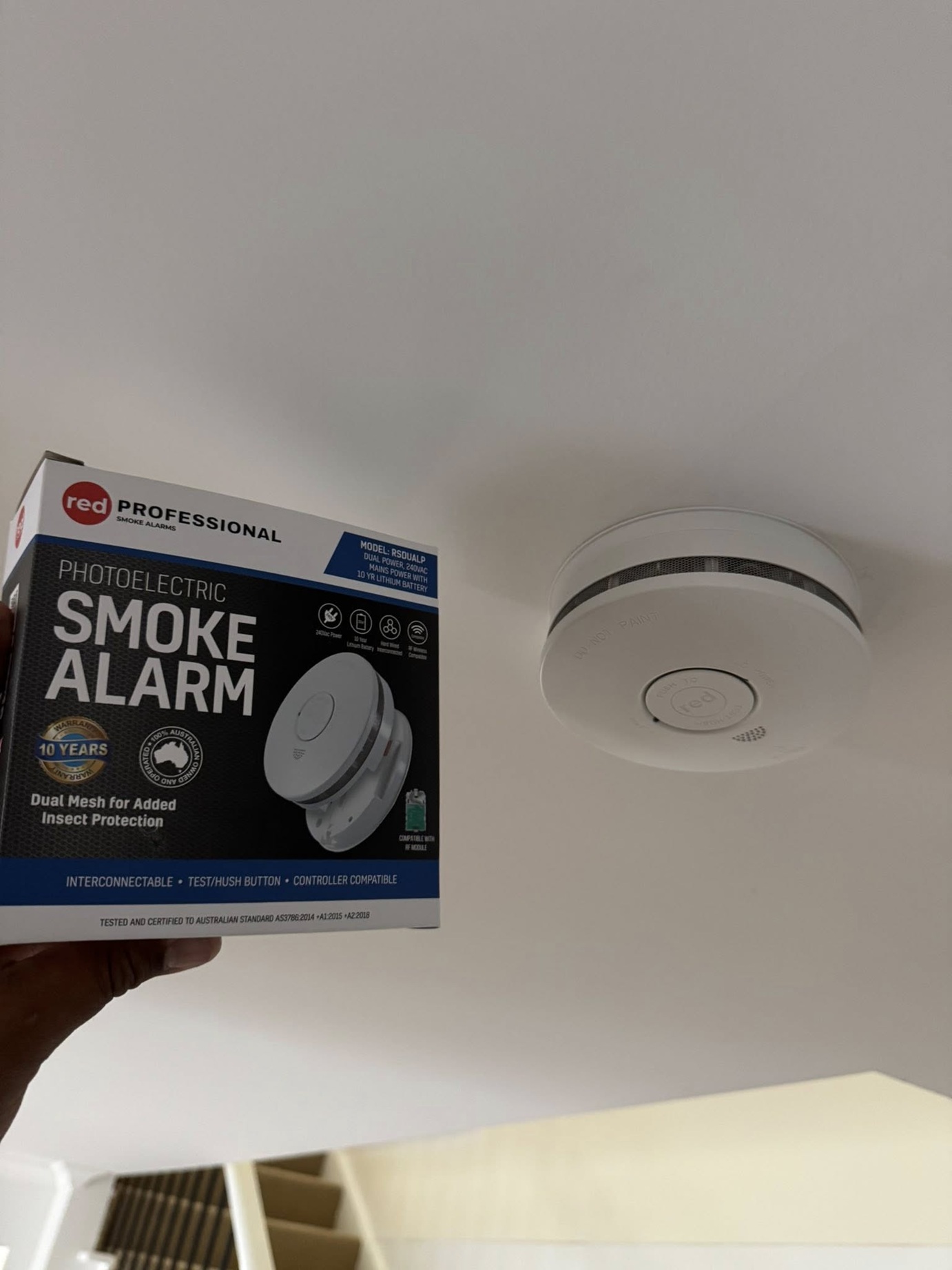 Photoelectric smoke alarm installation - QLD 2027 compliance by Fully Spark'd Electrical