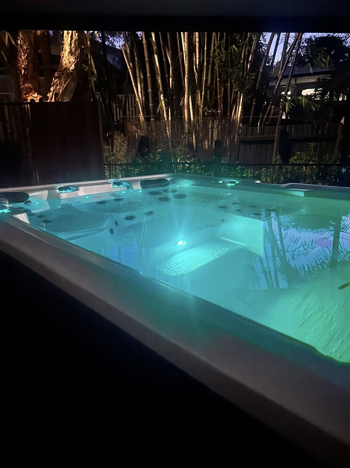 Spa LED lighting at night - aqua underwater lighting installation by Fully Spark'd Electrical